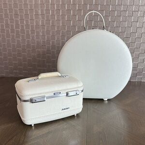 American Tourister travel set round suitcase with train case white